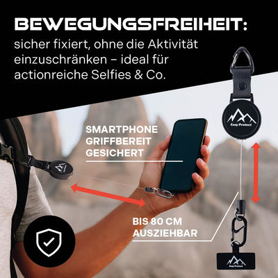 Infografik: Person hält ein Smartphone, das mit einem ausziehbaren Sicherungsseil an Kleidung/Tasche befestigt ist; Text „BEWEGUNGSFREIHEIT …“, „Smartphone griffbereit gesichert“, „bis 80 cm ausziehbar“ und Produktdarstellung.